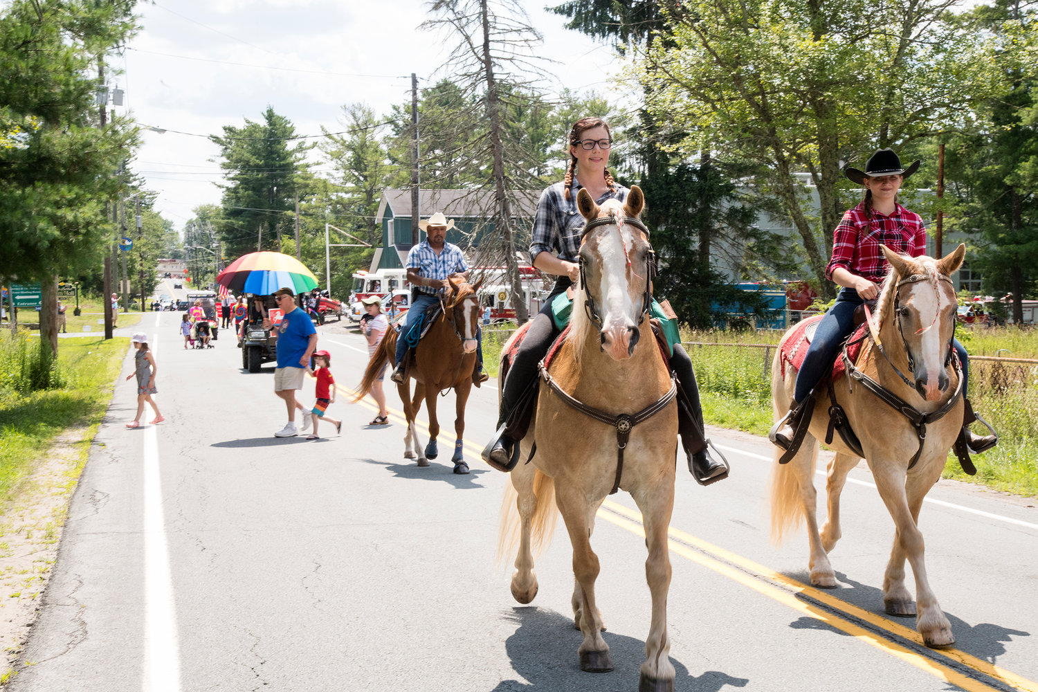Horses like parades too. Riders from Bethel’s Rolling Stone Ranch hoofed it over to join the march.